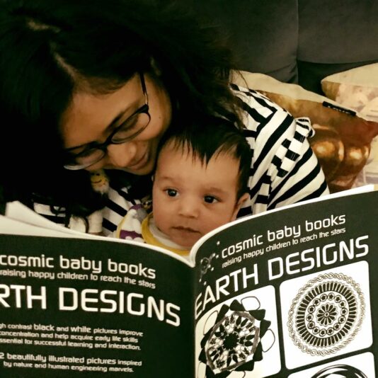 CosmicBabyBooks_NewbornReading_Captain_photo